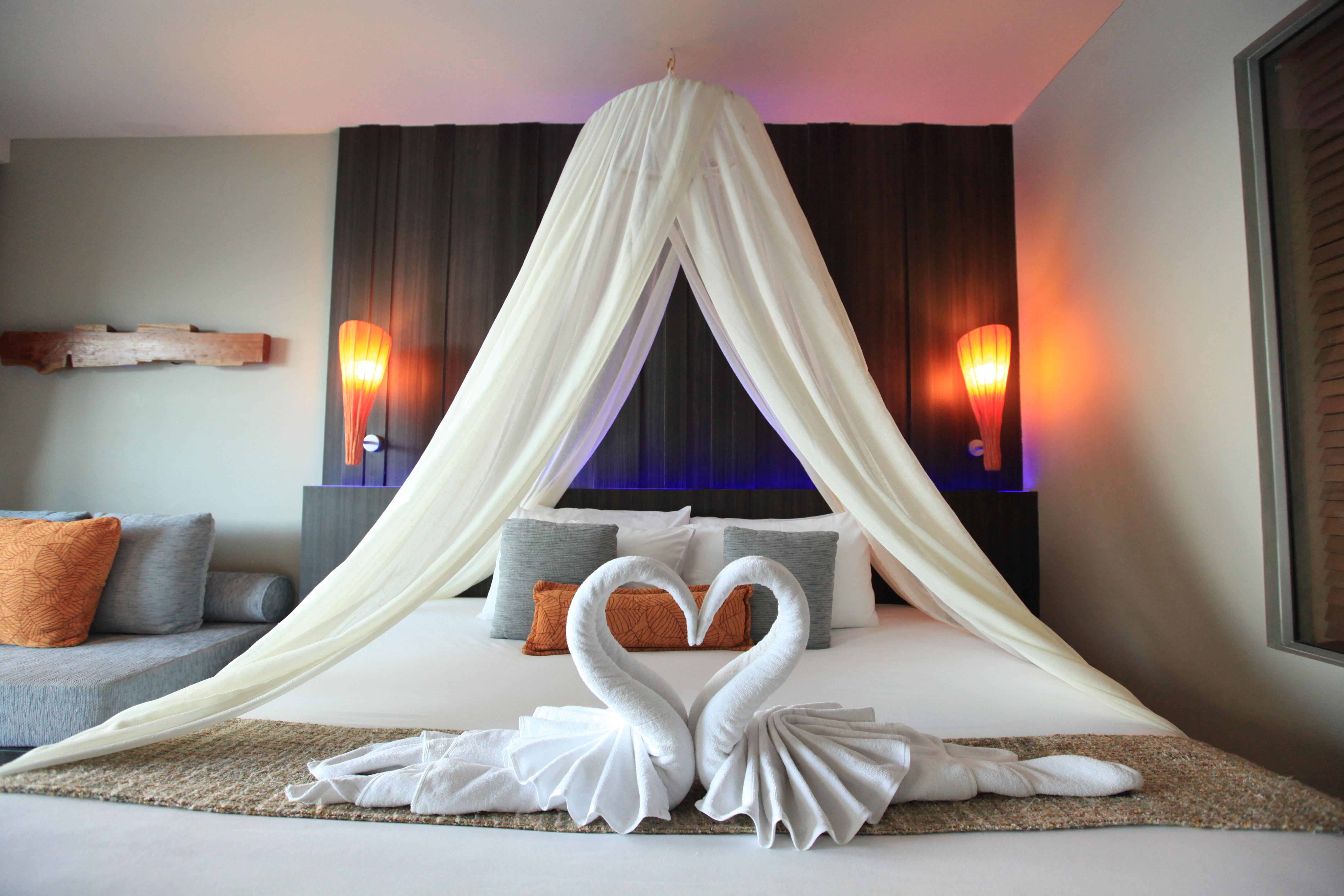 فندق كاليما ريزورت آند سبا Patong المظهر الخارجي الصورة A bed with a mosquito net